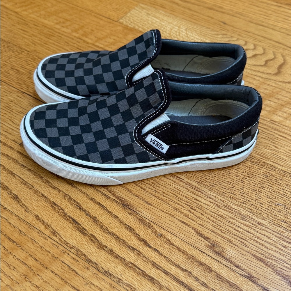 Vans Black Slip-On Sneakers with Checkerboard Design